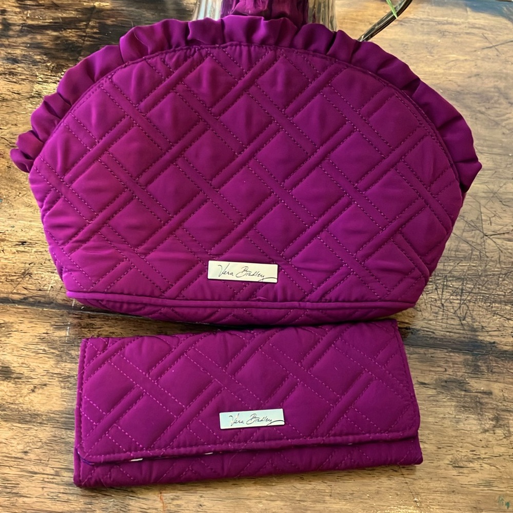 Vera Bradley clutch and matching wallet. Like new.
